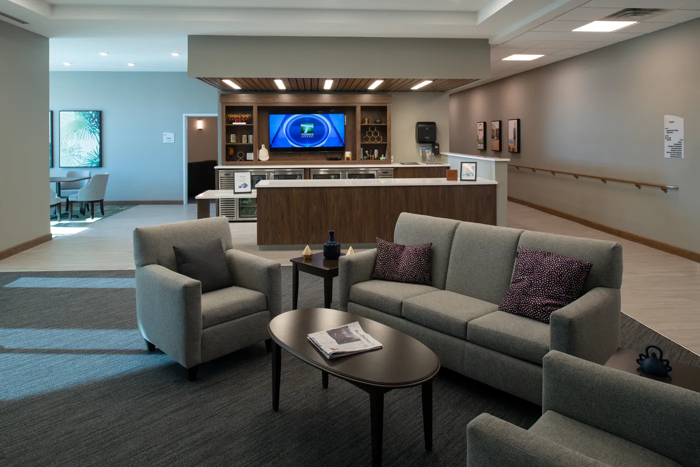 Comfortable hotel lobby with cozy seating, a reception desk, and a welcoming atmosphere.