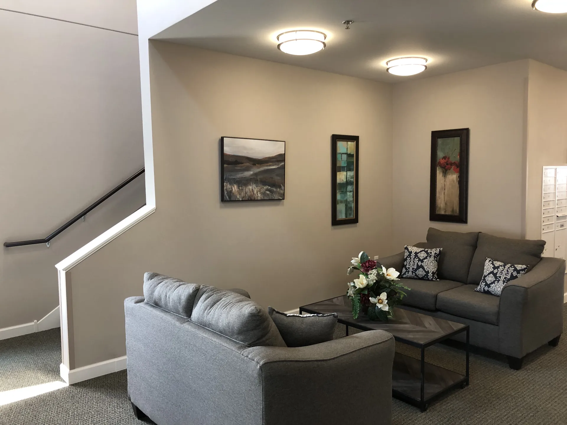 Cozy living room featuring stylish sofas, wall art, and a coffee table in a contemporary home settin.