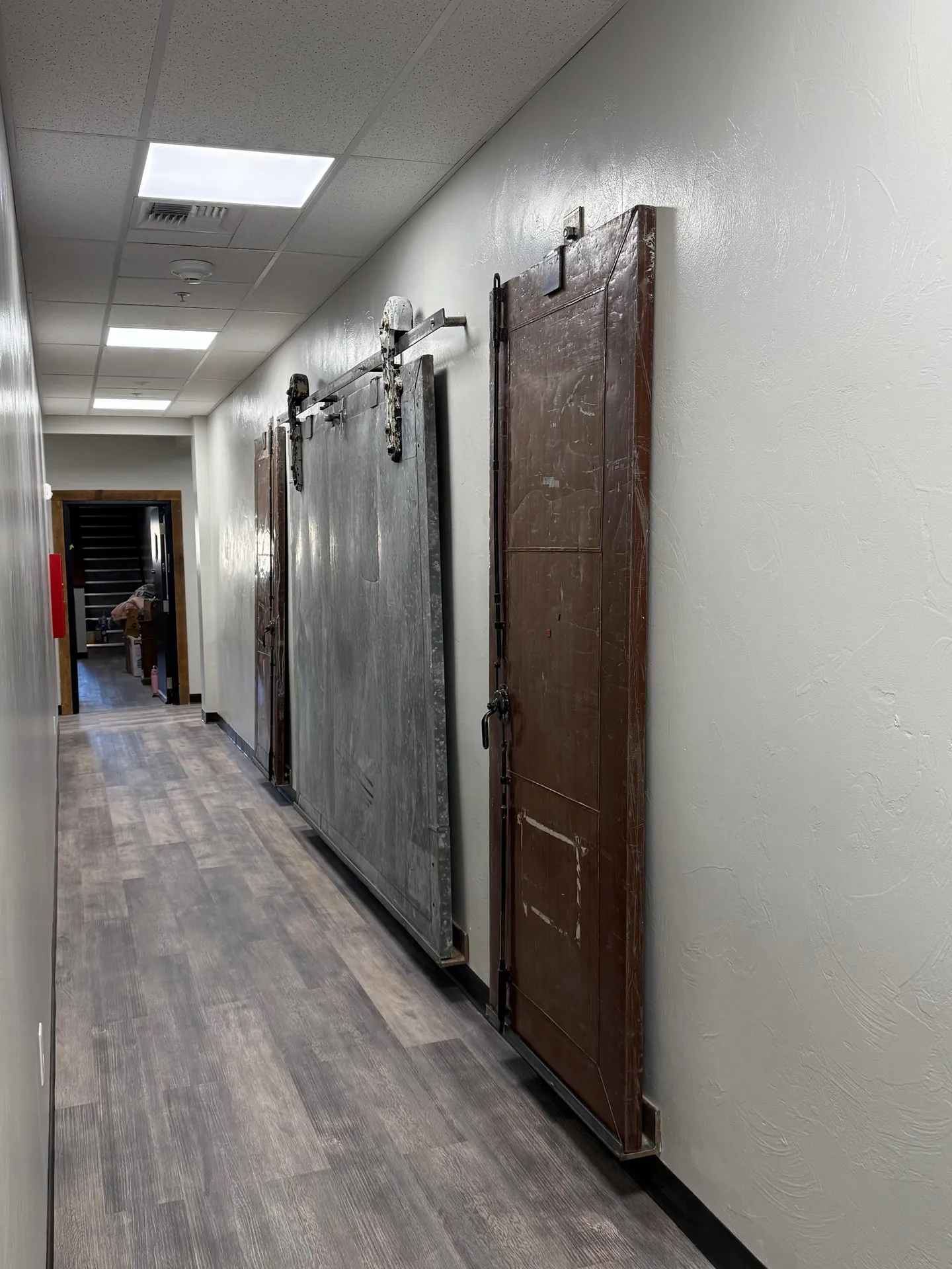 Garage door installation by CR Builders in a commercial space.